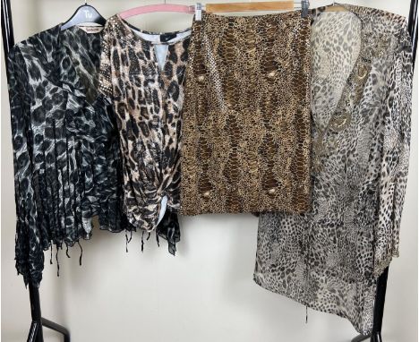 4 items of ladies animal print clothing. A black and white ruffle front blouse (size 16), a Tiger print t shirt top with stud