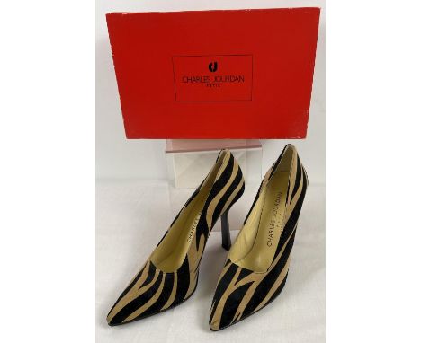 A boxed pair of animal print faux suede stiletto shoes by Charles Jourdan, Paris. US size 8B. 