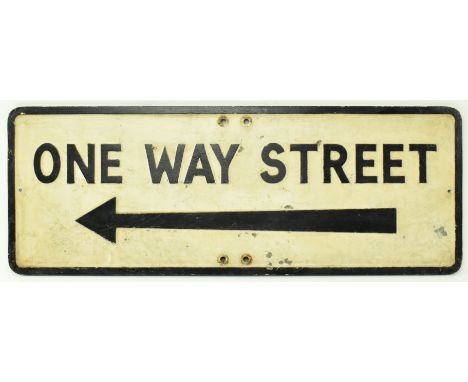 A vintage 20th century cast aluminium road sign for One Way Street. The sign of rectangular form having raised lettering in b