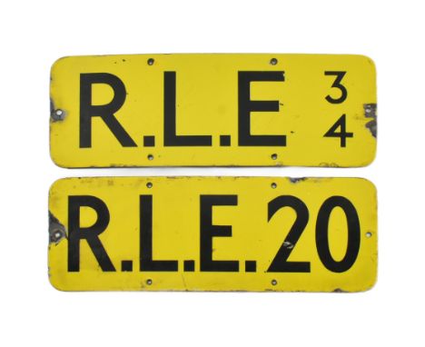 Railwayana - Two vintage mid 20th century train related porcelain enamel signs. Each having yellow ground with black letterin