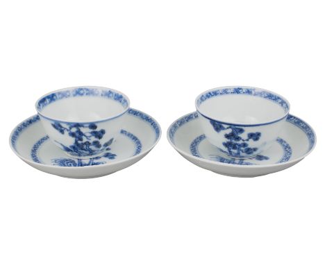 FINE PAIR OF CHINESE NANKING CARGO BLUE AND WHITE PORCELAIN CUPS &amp; SAUCERS, 18th CENTURY  Each decorated with pine trees.