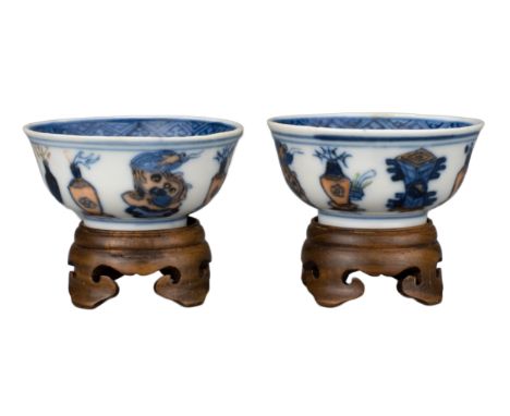 PAIR OF CHINESE PORCELAIN WINE CUPS, GUANGXU MARK AND PERIOD, 19th CENTURY  Decorated with various treasured items in undergl