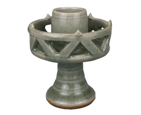 CHINESE YUAN / MING DYNASTY LONGQUAN CELADON OIL LAMP  With open work body on a splayed ribbed base. 13/14th century. 8.5cm d