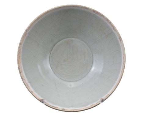 CHINESE QINGBAI PORCELAIN BOWL, SOUTHERN SONG DYNASTY  Incised decoration to the interior of stylised ‘twin fish’ covered in 