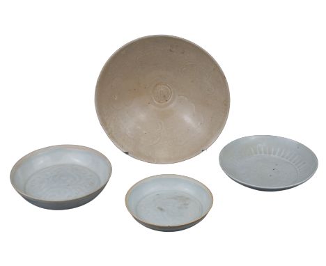 FOUR SONG AND YUAN DYNASTY BOWL AND DISHES  Song Dynasty Qingbai porcelain dishes together with a Yuan Dynasty white glazed c