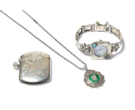 A silver vesta case, Birmingham assay mark, a silver and enamelled fob, Irish harp motif, plated chain, a silver and enamelle