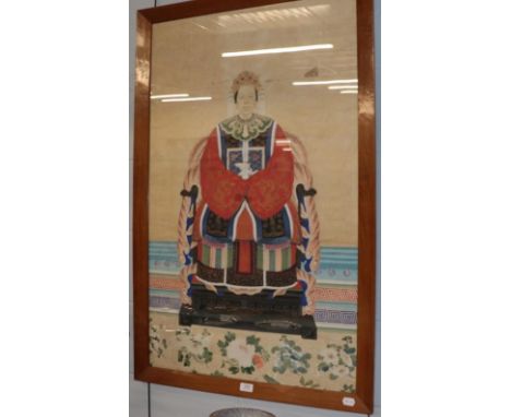A framed Chinese portrait of an Empress seated upon a throne, dressed in silk robe with rank badge, print and coloured in gou