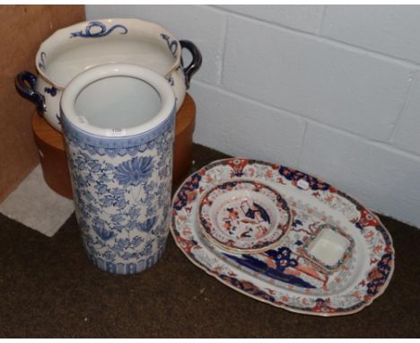 An early Victorian Masons Ironstone china meat dish decorated in the Imari palette, together with a pair of matching soup pla