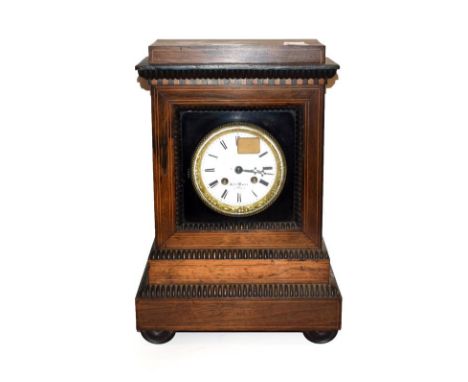 A 19th century French inlaid rosewood striking mantel clock, with gilt bezel and enamel dial singed Hry Marc, Paris, 37cm