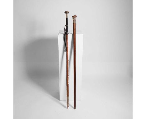 A winter Alpine stick, 20th century, Basque Country, with a horn pommel and braided leather handle, the white-metal mounts en