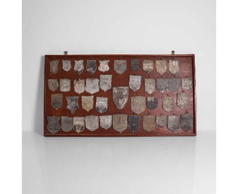 A collection of forty lead-roof-slaters' lead trade plates, 18th-19th century, Dutch, to include an example moulded with init