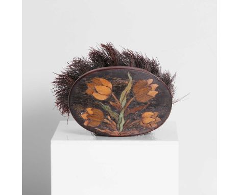A specimen-wood-inlaid clothes brush, c.1680, English, inlaid with tulips,8cm long5.5cm deep excluding bristlesFormerly in th