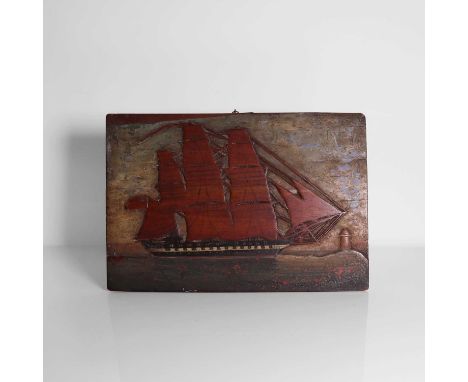 A sailor's folk art carved wooden panel of a British warship, c.1820, modelled in full sail, with cannons formed from pins,25