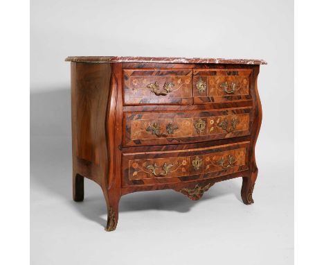 A walnut, rosewood and marquetry commode, mid-18th century, French, probably by Pierre Roussel, with a serpentine marble top 