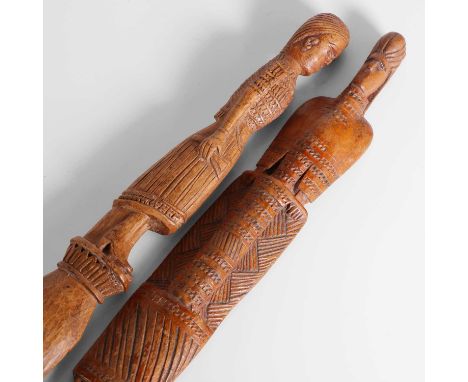 Two folk art carvings, 19th century, Greece, both formed as stylised figures,31.5 and 32.7cm long (2)Condition ReportGeneral 