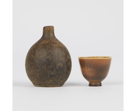 Group of two miniature Scandinavian ceramic vessels. Includes one vase with a bulbous form and one delicate cup with a dapple