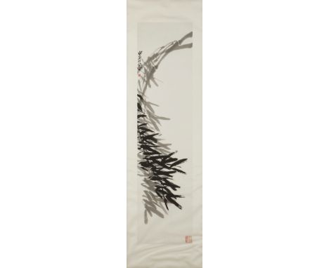 After Qi Baishi (Chinese, 1864-1957). Chinese scroll painting in ink on paper of bamboo, depicting two hanging branches that 