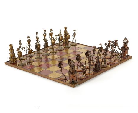 Metal and wood Brutalist chess set. Board stamped along the underside "Made in Germany PR." Figures formed from welded metal 
