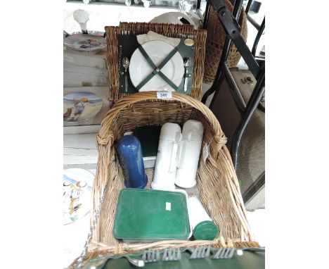 A modern wicker woven picnic basket hamper by Land Rover 