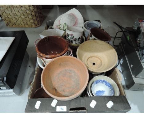 A selection of vintage ceramic and earthen ware planters and pots