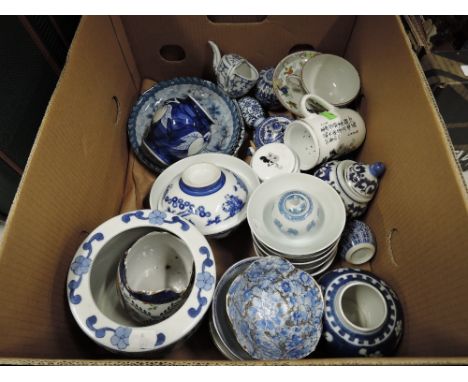 A selection of vintage blue and white ceramics including oriental ginger jars
