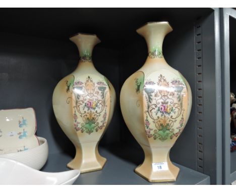 A pair of early ceramic mantle vase with print decoration and gilt trim