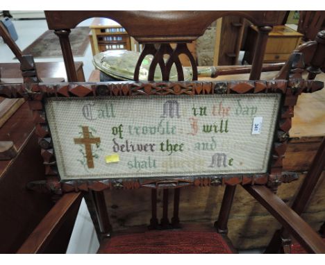 A framed ecclesiastical tapestry scripture