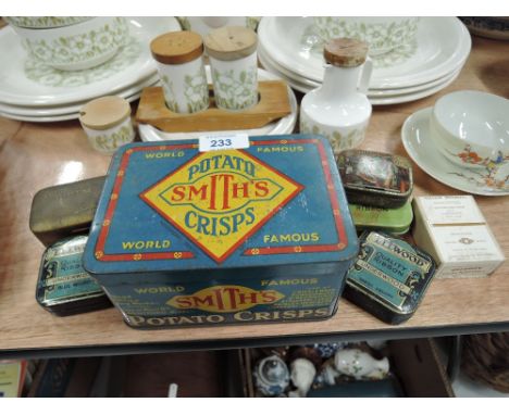A selection of vintage tins and advertising
