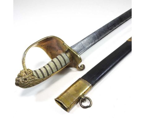 A 19th century naval 1827 pattern sword and scabbard, the bound fishskin grip, with a brass lion pommel and hinged brass hilt