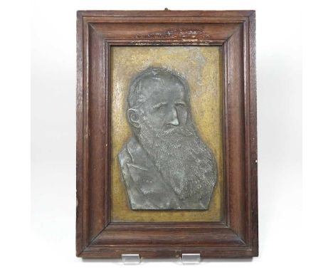 A Victorian lead portrait plaque, signed HOAM and dated 1884, inscribed F W, Remnant esq JP, to the reverse, mounted in an oa