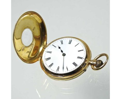 An 18 carat gold half hunter pocket watch, having a white enamel dial, with Roman hours, the movement signed Reid &amp; Sons,