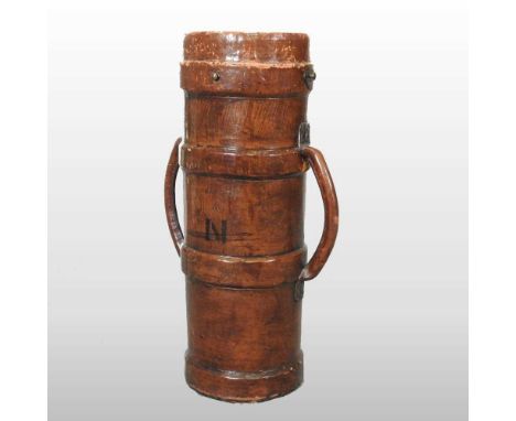 An early 20th century military leather shell case/stick stand, flanked by carrying handles, 72cm high