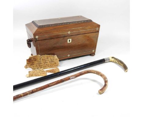 A Regency rosewood tea caddy, with a fitted interior, 32cm wide, with a partial letter written about the gifting of the caddy