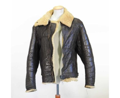 A World War II period American Air Force brown leather flying jacket, with a wool lining, bearing a label inscribed TYPE B-3,