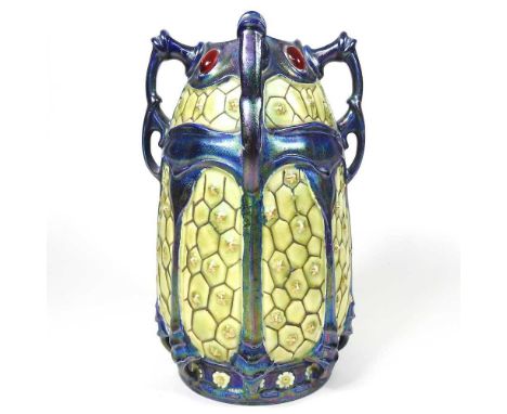 A rare Art Nouveau Zsolnay Pecs scarab vase, circa 1900, with an iridescent honeycomb eosin glaze and four organic shaped han