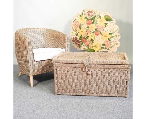 A wicker armchair, together with a blanket box, 85cm wide, and a painted fire screen (3)