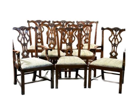 A set of eight Chippendale style mahogany dining chairs, late 20th century, each with a carved back and drop on seat, to incl