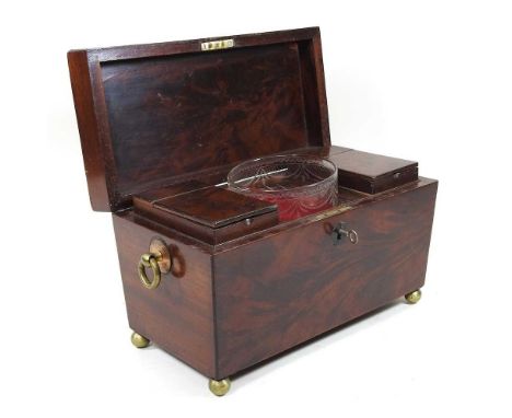 A 19th century mahogany and ebony strung tea caddy, fitted with a pair of canisters and a glass bowl, on brass ball feet, 31c