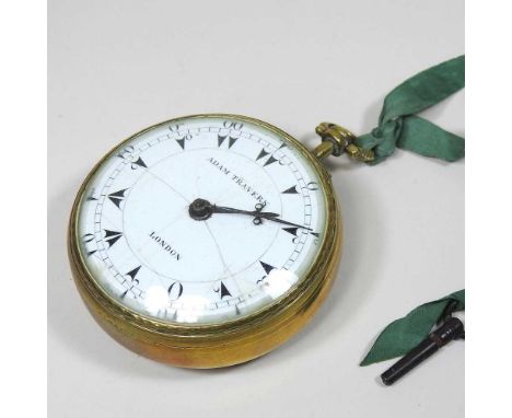 A large 18th century brass cased pocket watch, the white enamel dial signed Adam Travers, London, the key wind movement numbe