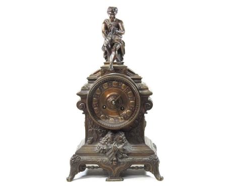 A 19th century French bronzed figural mantel clock, the case decorated with scrolls and surmounted by a seated figure, the ei