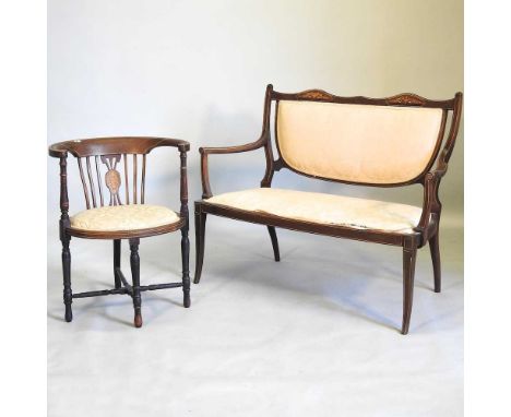 An Edwardian mahogany and inlaid sofa, 118cm wide, together with a similar tub shaped armchair (2)