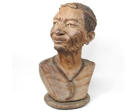 Norman Chapotekra, African, 20th century, a life sized carved hardwood portrait bust, of a man, wearing a necklace, signed an