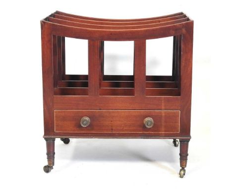 A George IV mahogany and boxwood strung three division canterbury, containing a single drawer, on ring turned legs and brass 