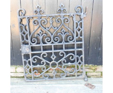 A cast iron garden gate, made by Cocksedge of Ipswich, 90 x 106cmHeavy and well made. Generally dirty, with paint losses. Mea