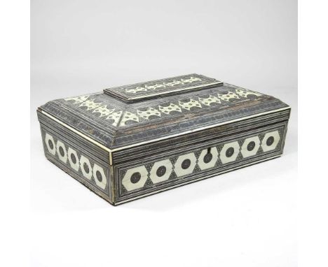 A 19th century Indian sadelli inlaid work box, with geometric decoration, 33cm wide. Note: a non-transferable ivory exemption