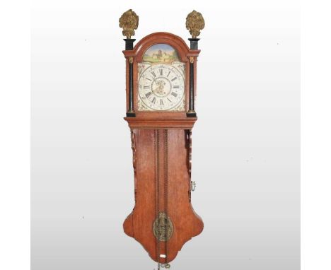 A 19th century Dutch tail clock, the eight inch dial painted with a landscape, having a thirty hour movement, 106cm high