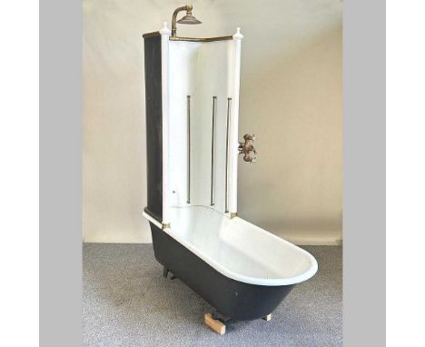 A Victorian enamelled roll top canopy bath, with brass taps, pipes and fittings, to include a Shanks patent brass pump174l x 