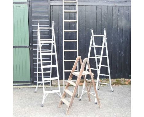 An aluminium extending ladder, together with two step ladders and a small wooden stepladder (4)