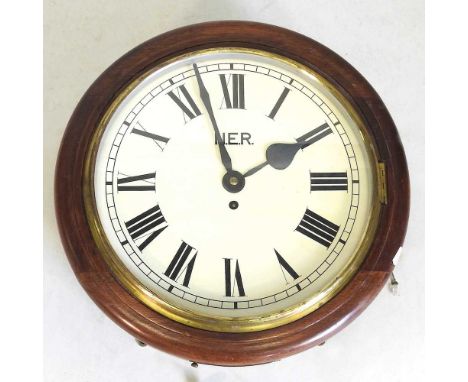 A late 19th century mahogany cased NER railway dial clock, with a painted thirteen inch dial, single fusee movement and addit