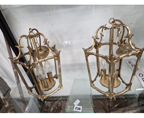 A PAIR OF BRASS THREE LIGHT SOCKET LANTERNS